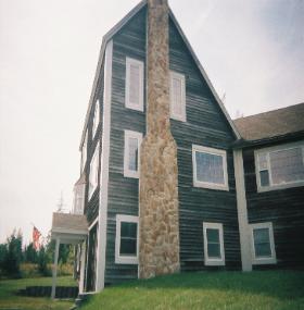 Cultured Stone chimney built by Portland Maine chimney contractor, RL Sanborn Masonry