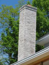 A specialty brick chimney is replaced
