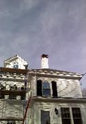 Brick chimney prior to be removal and replacement.