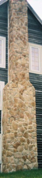 Cultured stone Chimney Installation By RL Sanborn Masonry, Portland Maine.