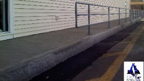 Concrete sidewalk with granite curbing